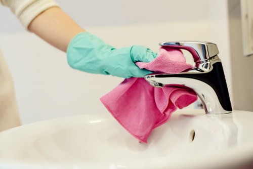 Streak-free glass cleaning with squeegee and microfiber tools