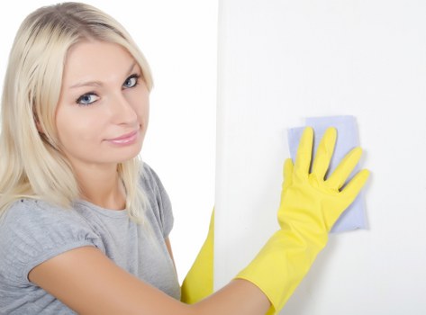 Bathroom deep cleaning with scrubbing of tiles, grout, and fixtures